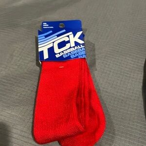 TCK red brand new baseball socks! Size large.